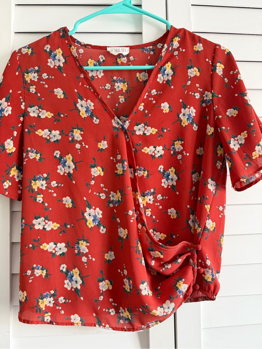 Sienna Sky Red Floral Wrap-Style V-Neck Blouse